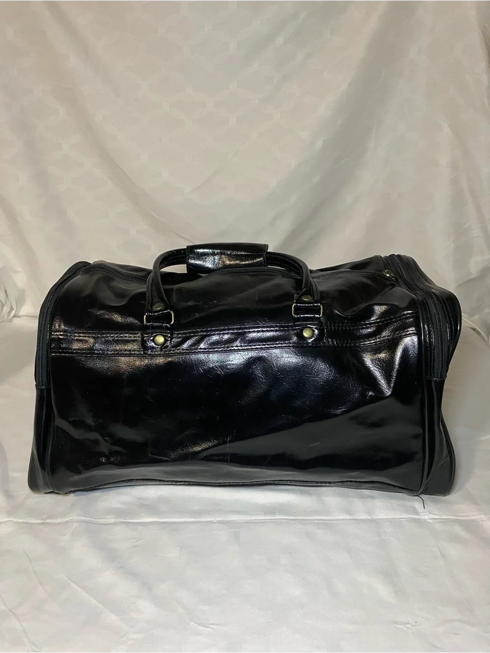 Black Glossy Travel Duffel with Gold Hardware